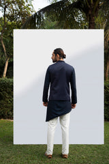 NAVY BLUE ASYMMETRICAL KURTA SET WITH NAVY BLUE EMBELLISHED BUNDI sasyafashion